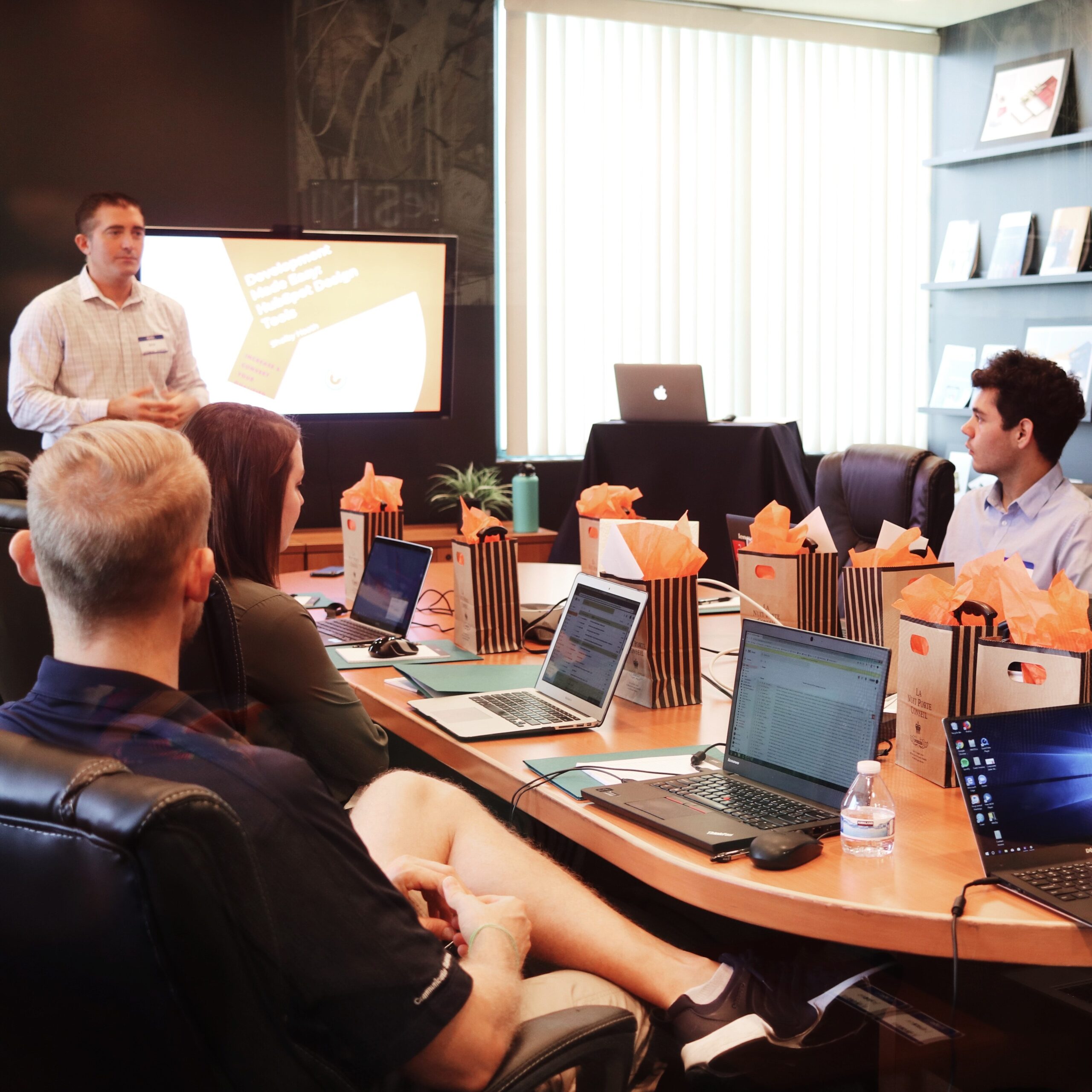 individual giving a presentation to an audience