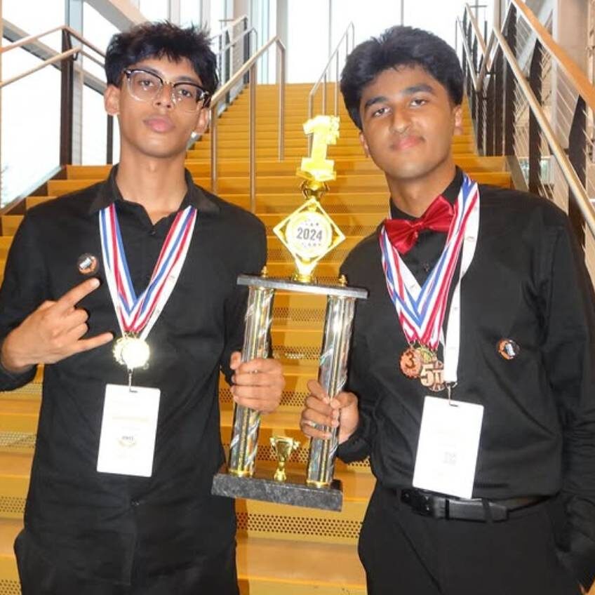 Sadat Ahmed holding MIST trophy.